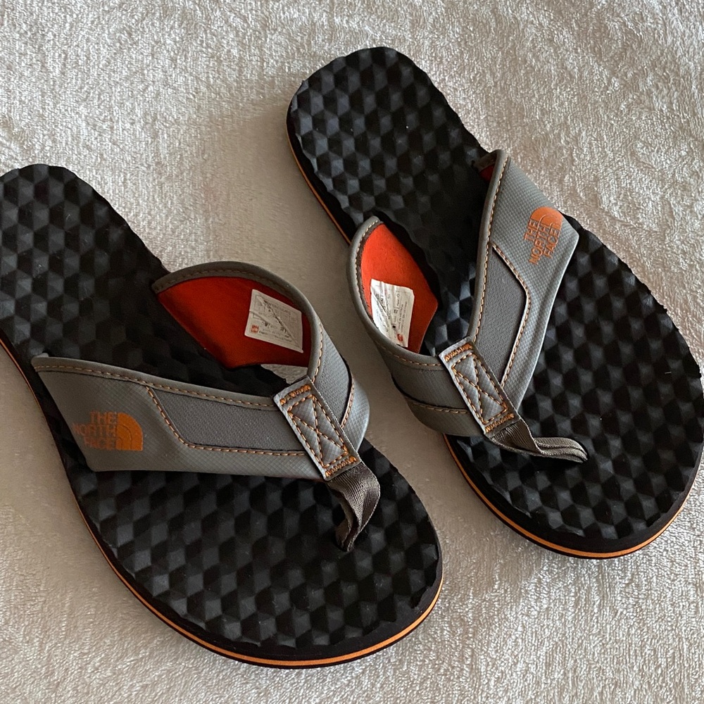 The North Face Black and Orange Flip-Flops